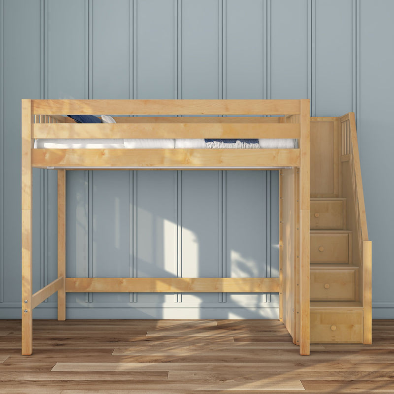 Light wood loft bed with staircase and built-in storage drawers against a blue paneled wall on hardwood floor