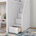 White wooden staircase with built-in storage drawers and pull-out under-stair drawer for space-saving loft bed
