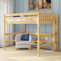 Natural wood loft bed with side ladder over cozy reading nook featuring a light gray armchair with blue pillow, round wooden table, and light blue paneled wall