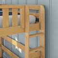 Natural light wood bunk bed ladder and safety rail on twin upper bunk with knitted gray blanket and blue paneled wall