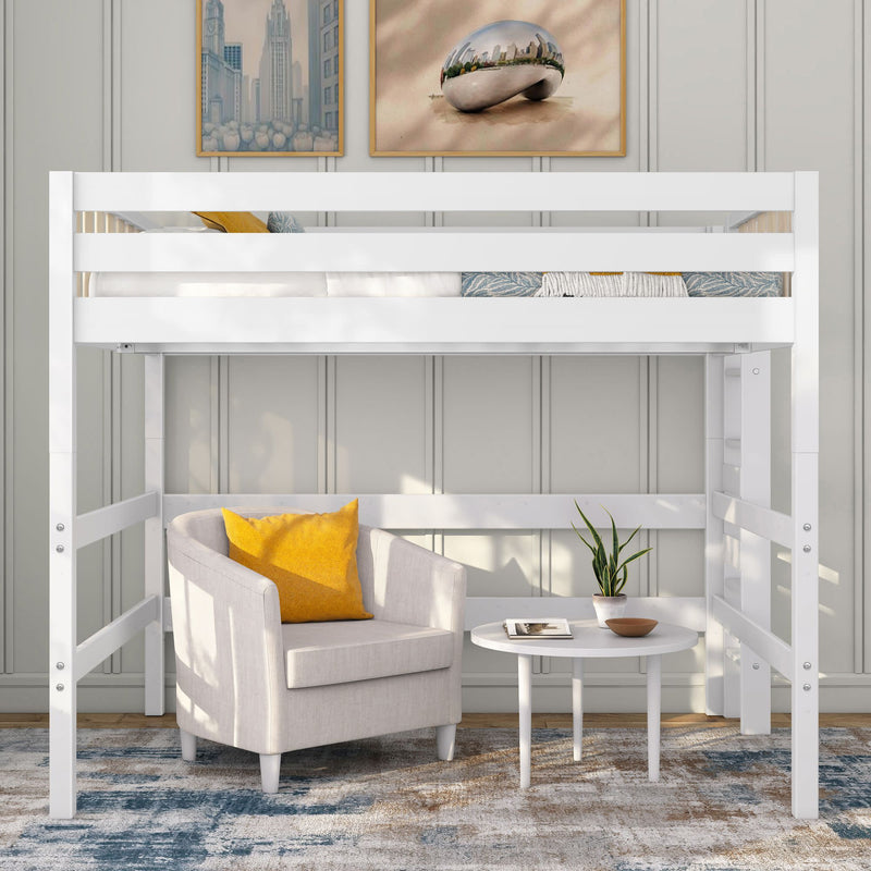 White wooden loft bed with beige armchair and yellow accent pillow underneath, round white side table with potted plant and modern wall art