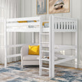 White wooden twin loft bed with ladder over cozy reading nook featuring a gray armchair and yellow pillow in a modern space-saving kids' bedroom
