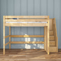 Natural wood loft bed with built-in staircase and three storage drawers against blue paneled wall on hardwood floor