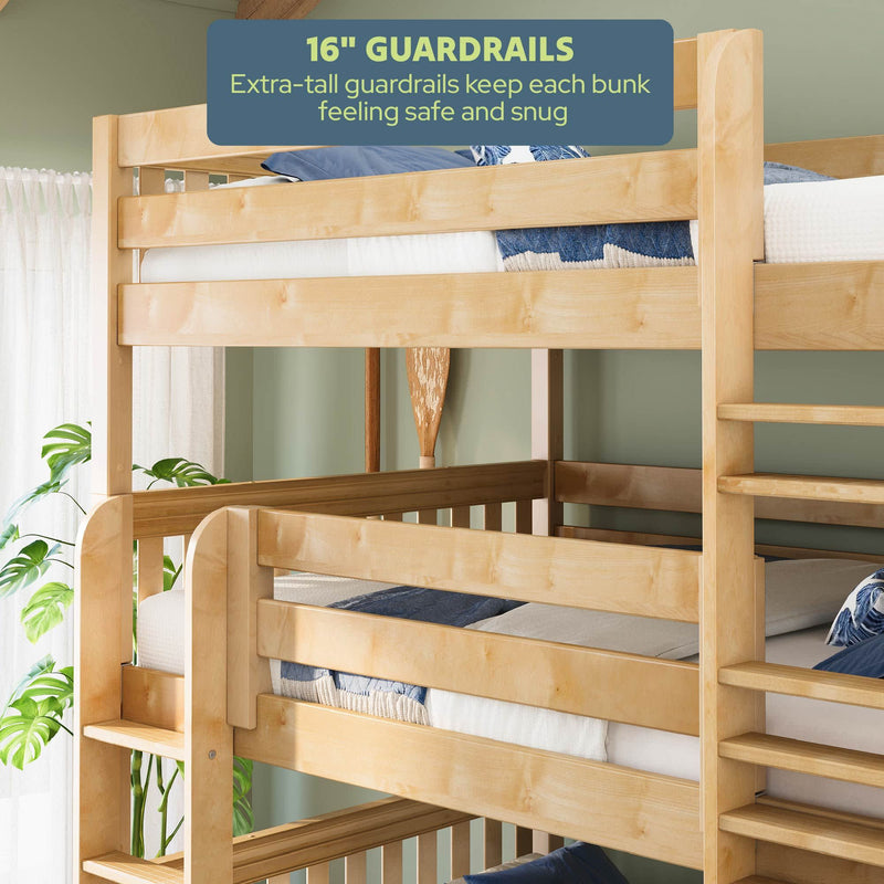 Triple bunk bed in light natural wood with 16-inch extra-tall guardrails, integrated ladder and blue-white bedding in a kids' bedroom