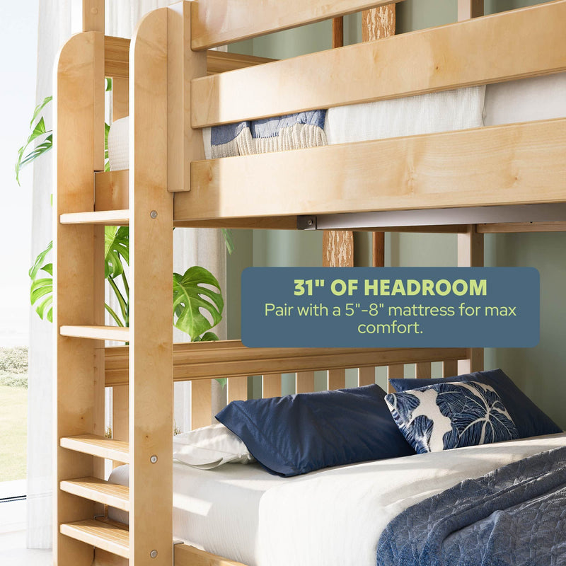 Maple wood twin-over-full bunk bed with ladder, 31-inch headroom, styled with navy pillows and coastal décor — ideal for a 5–8-inch mattress