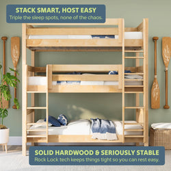 Solid hardwood triple bunk bed with built-in ladder and guardrails in coastal bedroom – space-saving beds for kids and guests