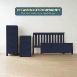Pre-assembled navy blue bedroom furniture with dresser, bed frame, and drawers on wooden floor.