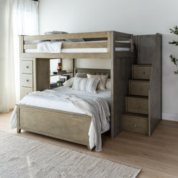 Rustic wooden loft bunk bed with built-in storage and staircase in a modern bedroom.