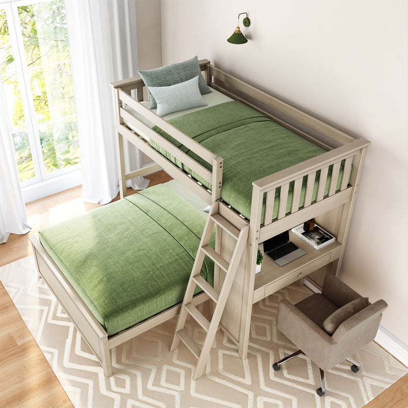 Loft bed with green bedding and built-in desk in a bright bedroom with natural light.