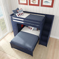 Navy blue bunk bed with storage stairs and sea-themed pillows in a coastal bedroom.