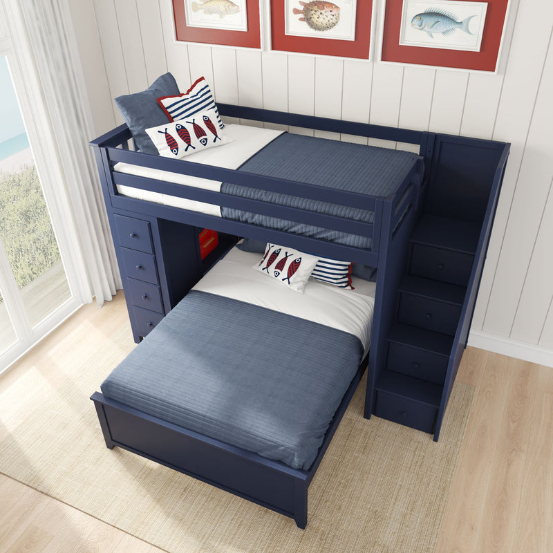 Navy blue bunk bed with storage stairs and sea-themed pillows in a coastal bedroom.