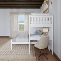 Stylish coastal bedroom with bunk bed and desk, featuring ocean view through window.