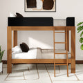 Solid wood twin-over-twin bunk bed with ladder and black guardrail, modern space-saving design for kids bedroom with white bedding
