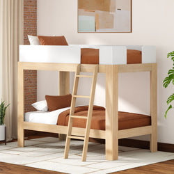 Modern natural oak twin-over-twin loft bunk bed with ladder and white guardrails, brown bedding and pillows in a space-saving kids' bedroom