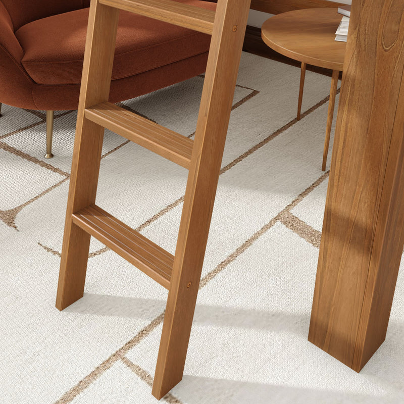 Close-up of a natural oak wooden ladder beside a mid-century modern rust upholstered chair and round wood side table on a cream geometric area rug