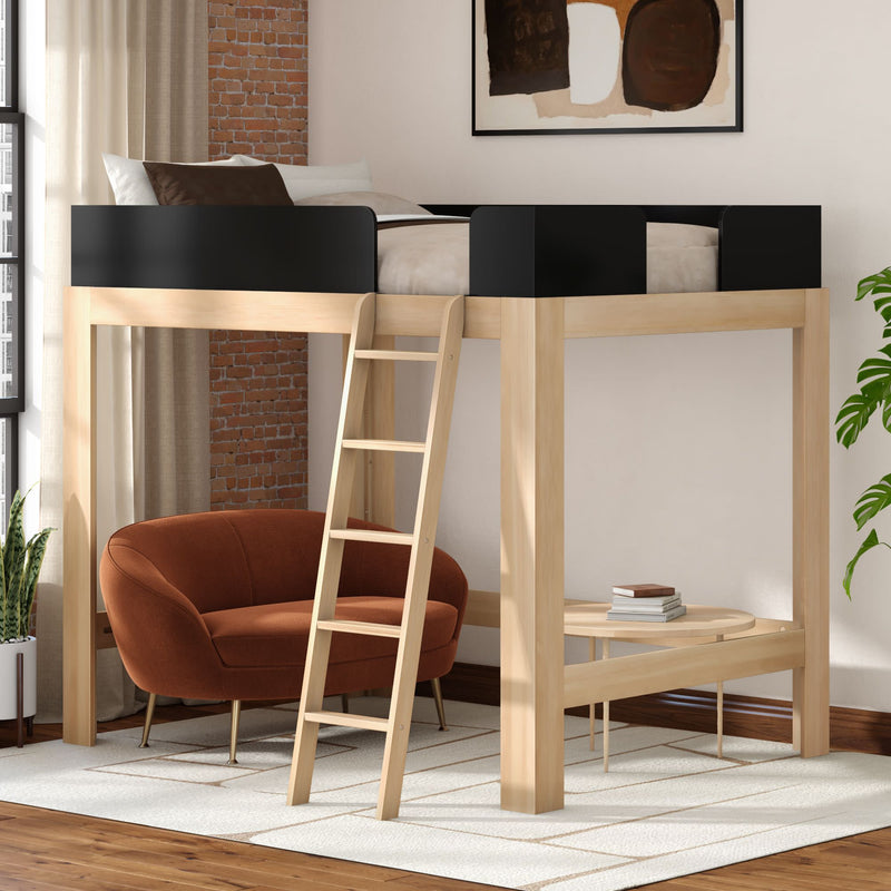 Modern light-wood loft bed with black safety rails and ladder over cozy rust velvet armchair reading nook, brick accent wall, potted plant and neutral rug on hardwood floor