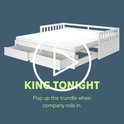 White wooden king-size daybed with pull-out trundle and two storage drawers, modern guest bed ideal for small spaces
