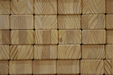 Stacked wooden blocks with varied grain patterns and textures.