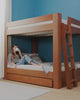 Black Friday sale video of woman on bunk bed.