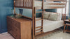 Beautiful modern bedrooms with dark, light, and white wood bunk beds with colorful bedding and decor.